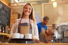 Teen female coffee shop employee