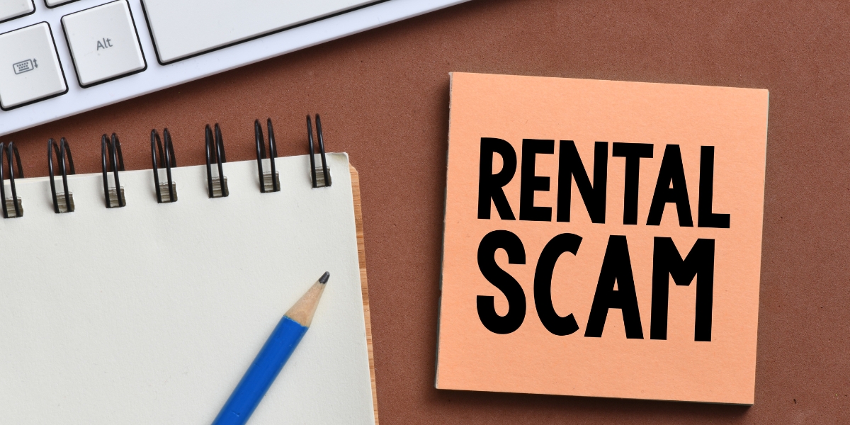 rental scam box with keyboard and notepad