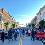 People viewing outdoor car show in downtown Mount Sterling